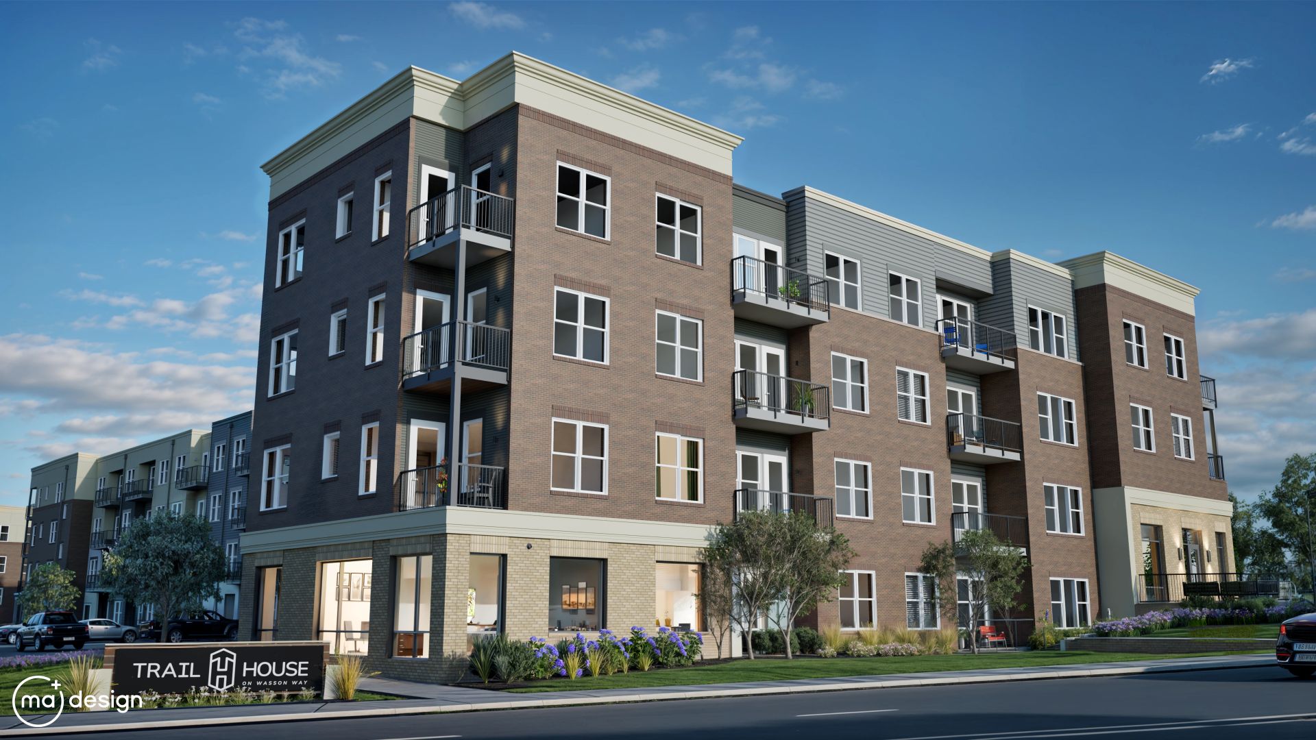 Exterior view of Trail House Apartments in Cincinnati, OH, with landscaped grounds and plants.